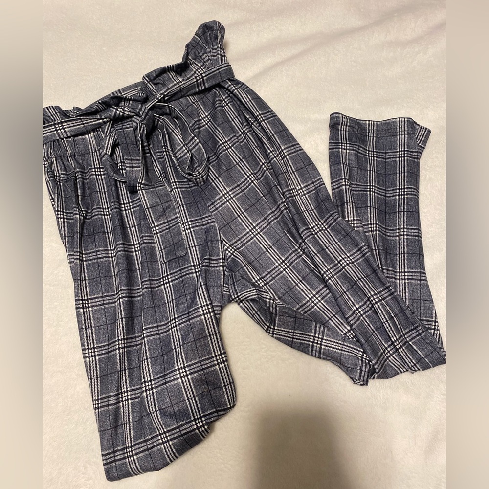 Dress pants have an adjustable belt, is made out of soft and stretchy material